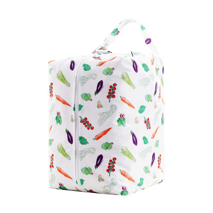 White bag with colorful vegetable pattern on a white background