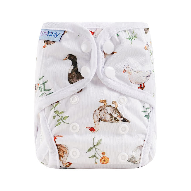 White cloth diaper with duck pattern on a white background
