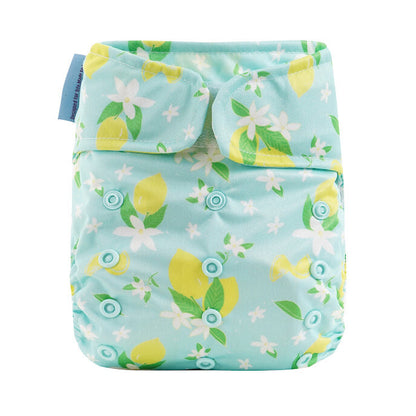 Reusable diaper with lemon and flower pattern on a light blue background