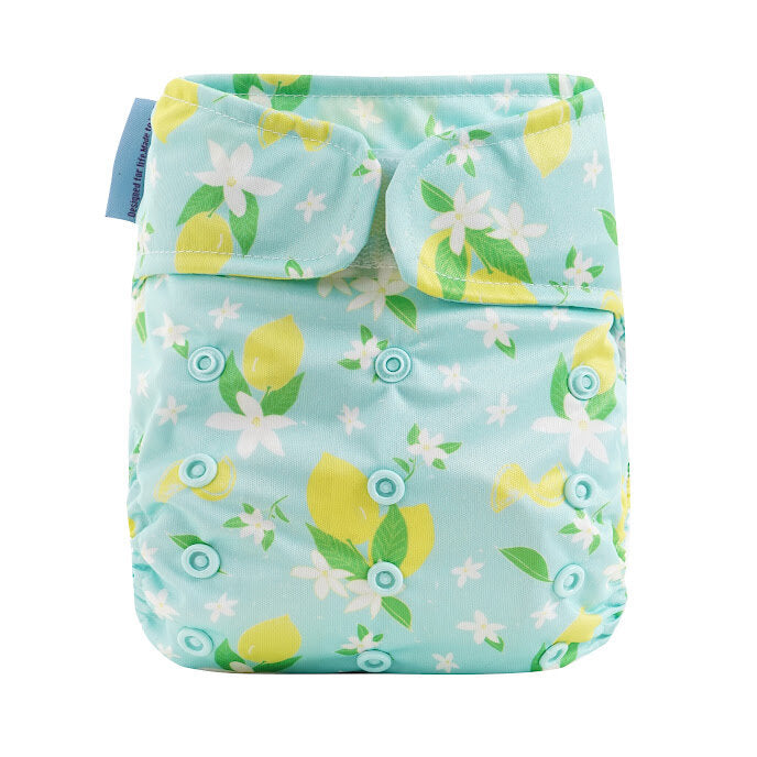 Reusable diaper with lemon and flower pattern on a light blue background