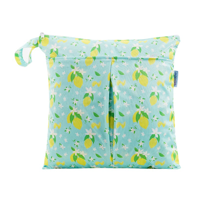 Reusable wet bag with lemon pattern on a light blue background