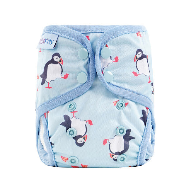Reusable diaper with penguin pattern on a white background